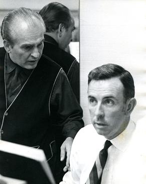 Conductor Anton Coppola and composer Floyd work on Of Mice and Men, c. 1969