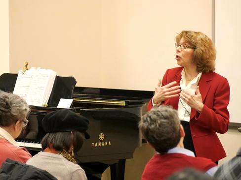 Conductor and composer Victoria Bond gives a pre-performance talk at the Met Opera Guild