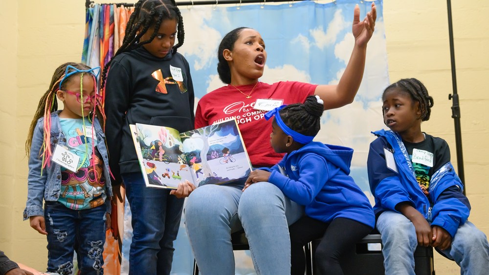 Soprano Denique Isaac (at center) performs as part of Opera Baltimore's Voice Your Story, an opera creation class for children. (photo: Theresa Keil)