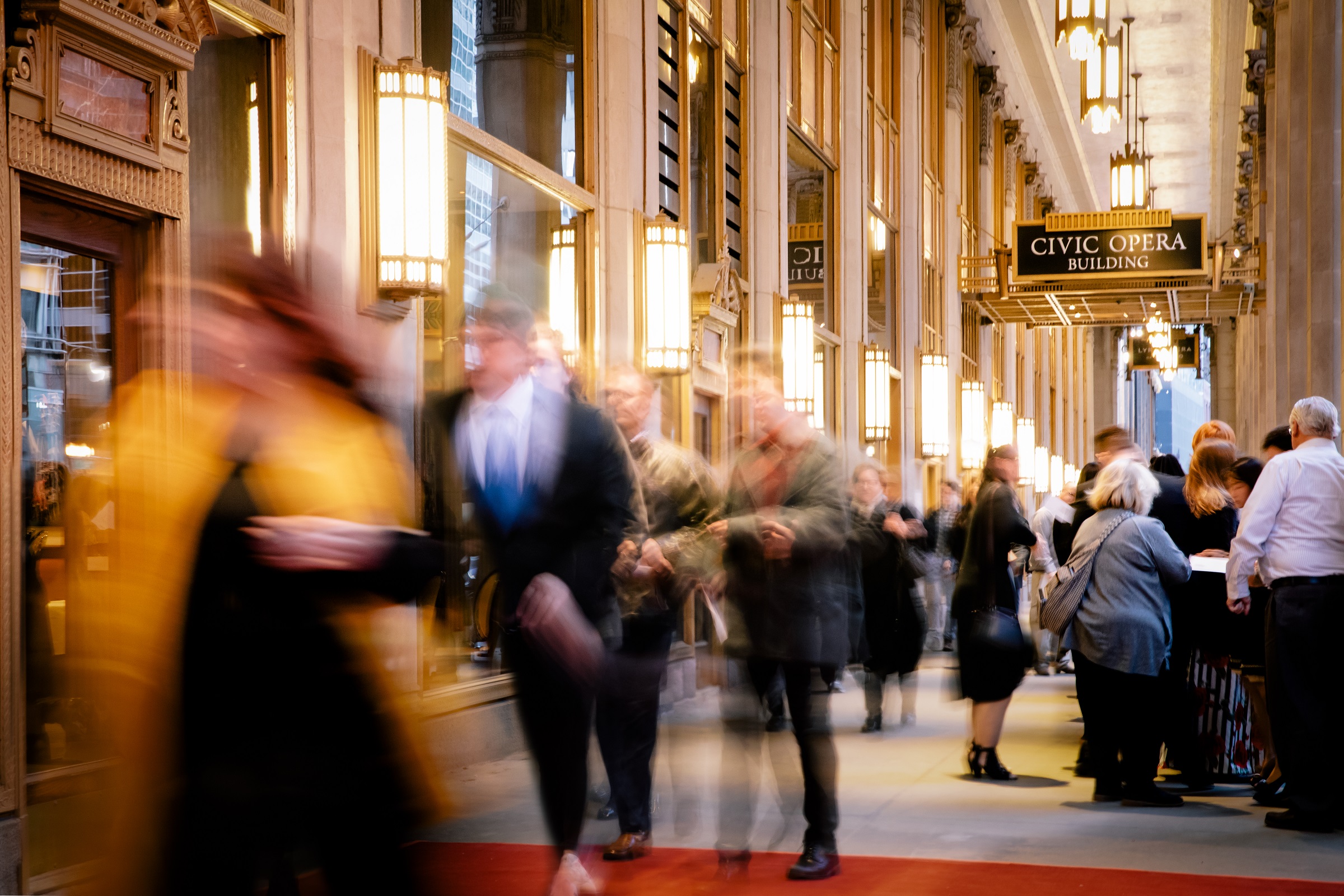Audiences gather in the portico of the Lyric Opera House, home to Lyric Opera of Chicago (photo: Kyle Flubacker)