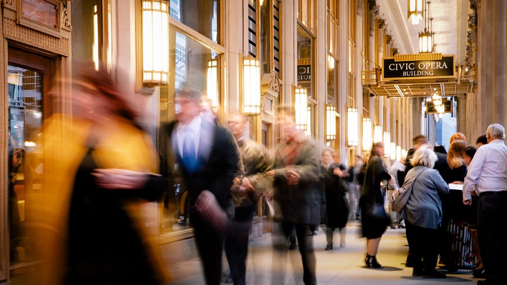 Audiences gather in the portico of the Lyric Opera House, home to Lyric Opera of Chicago (photo: Kyle Flubacker)