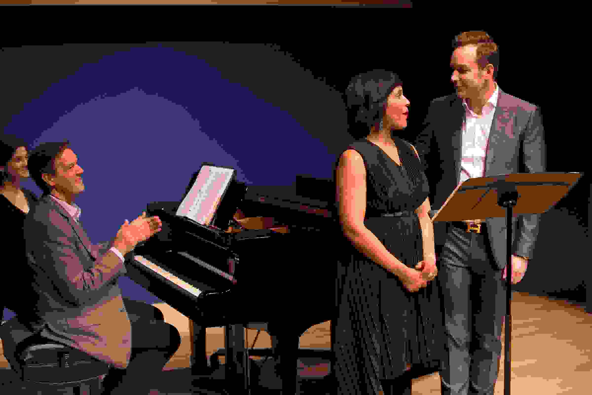 Composer Composer Jake Heggie applauds Talise Travigne and Stephen Costello at an Opera Center event